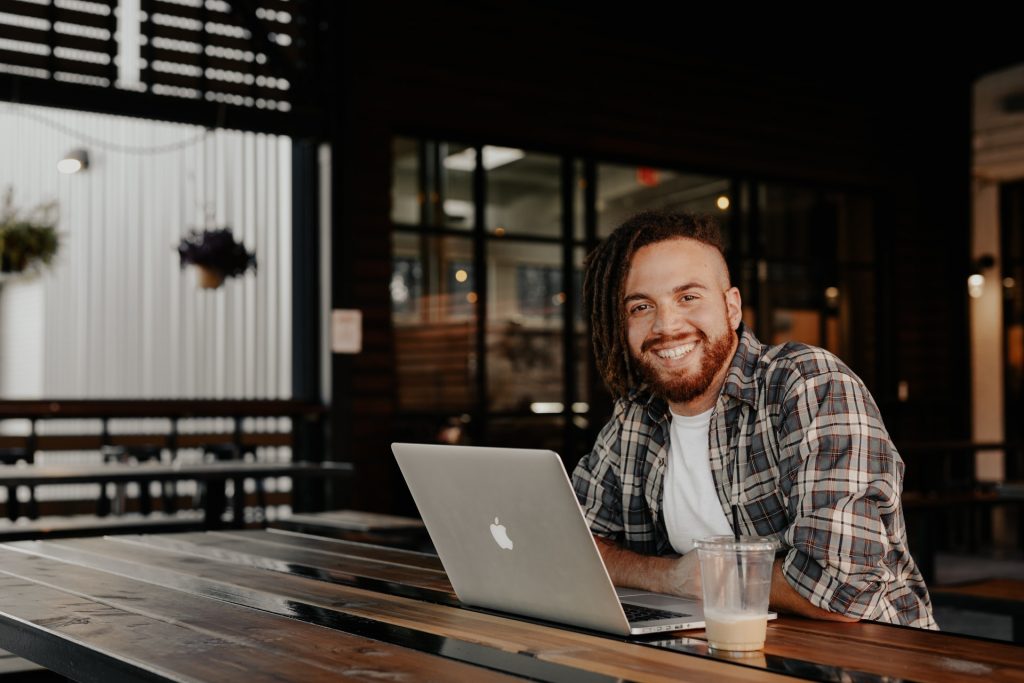 man using macbook